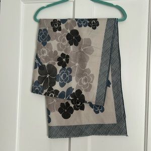 A lovely cachet of shawls & scarfs.